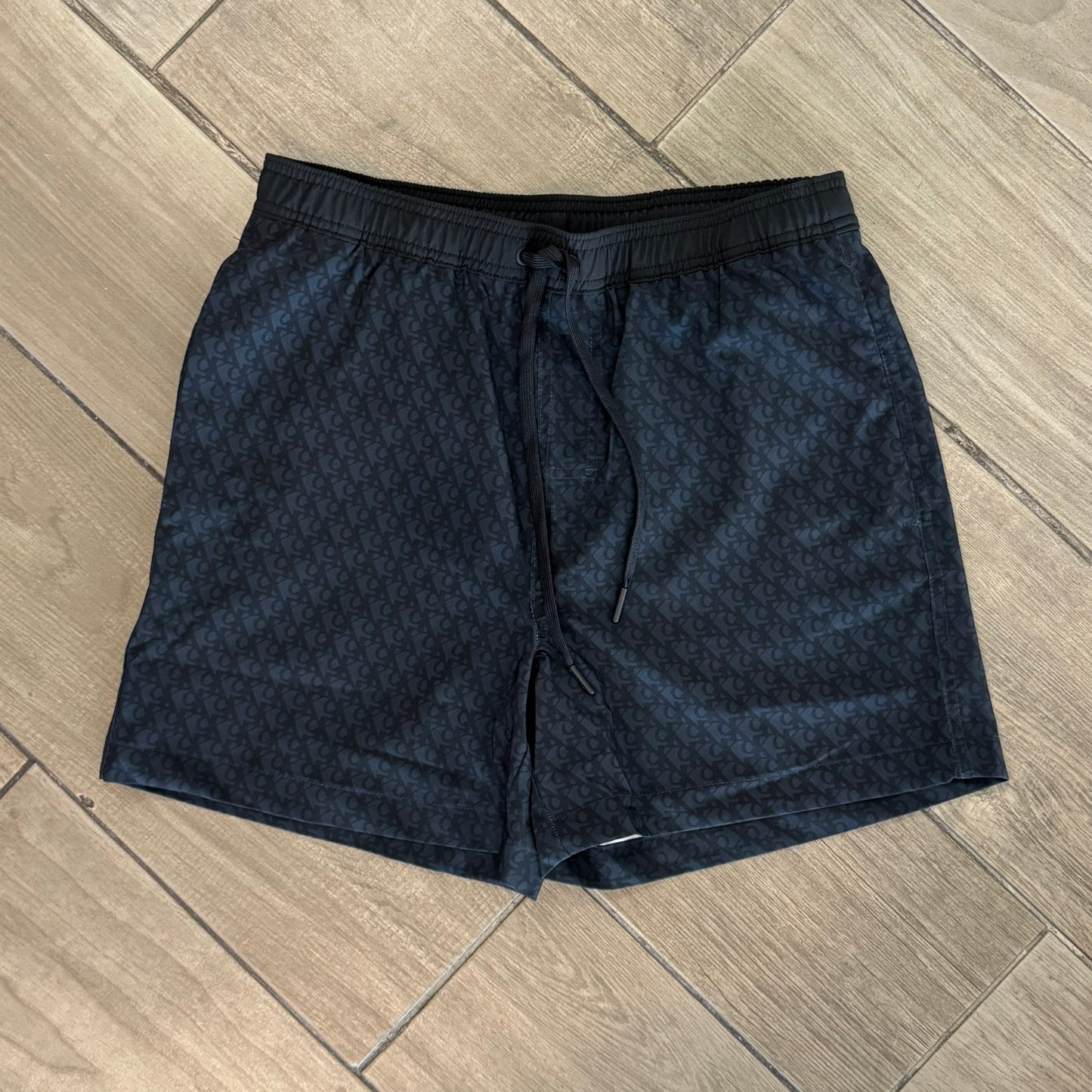 Short CK Monograma Azul/Negro